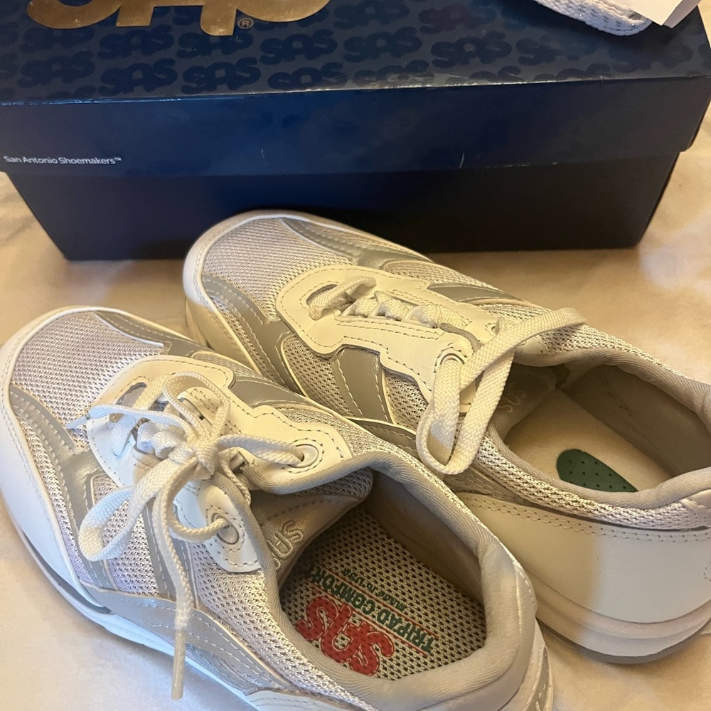 SAS Woman’s Silver sneakers. Only worn twice, like new. Got wrong size.